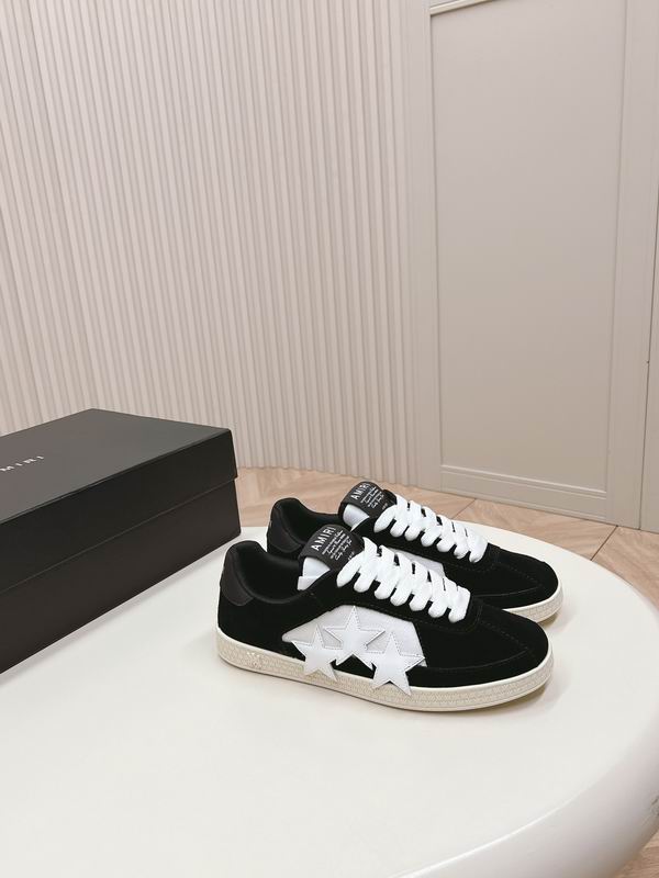 Amiri Stars Low Sneaker | Black/White Suede